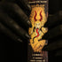 soot-black hands with claw nails holding a 20 pack of Krampus all natural incense