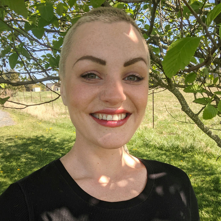 model wearing merlot lip tint
